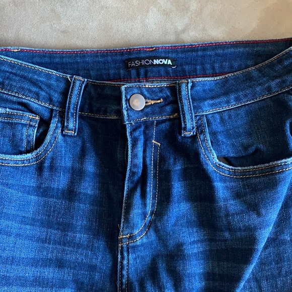 High waisted dark wash denim with slight distressing. - Picture 3 of 5